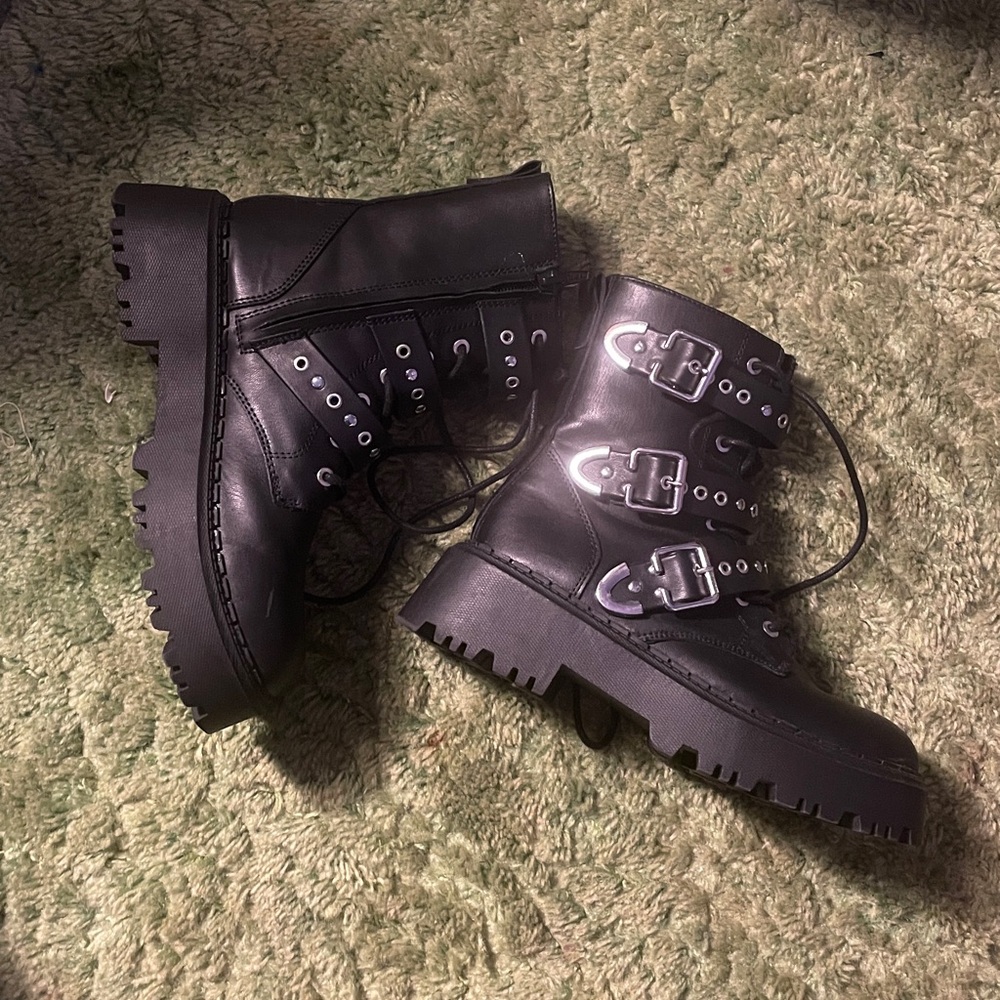 Buckled combat boots